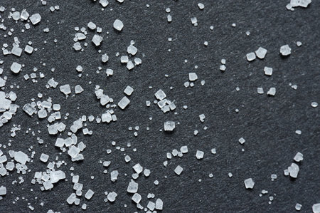 sugar crystals on black background macroの写真素材