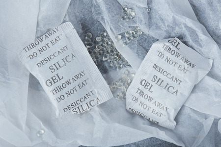 silica gel balls lay in package white paperの写真素材