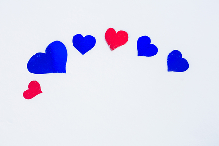 different shape heart  on white snow on Valentine's dayの写真素材