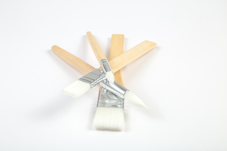 White paintbrushes with wooden handle on clear backgroundの写真素材
