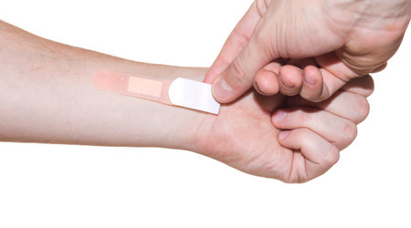 plaster on hand isolated on white background