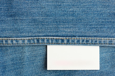 white jeans texture tag close up. Horizontal jeans background with stitchesの写真素材