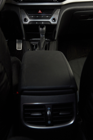 Panel of ac moder car conditioner in black interiorの写真素材