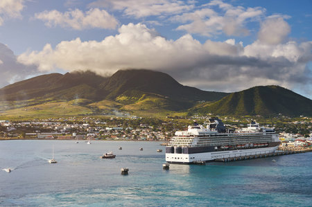 Port in caribbean island St Kitts sunny day time. Cruise ship docked on tropical island