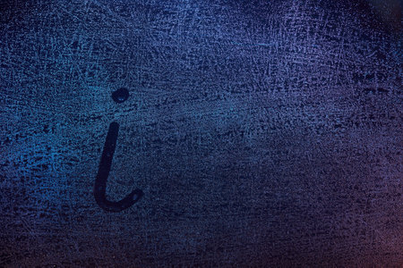 i letter symbol on frozen glass window. I letter concept draw on fog window glassの写真素材
