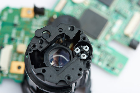 Camera lens focusing mechanism close-up. Digital photo camera lens repairing serviceの写真素材
