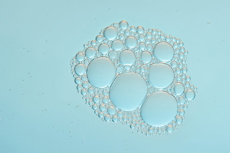Bubble foam close up on clear water calm surface background