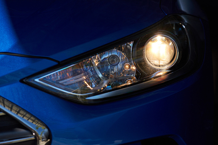 Car head light with led optic. Light from modern car led lensの写真素材
