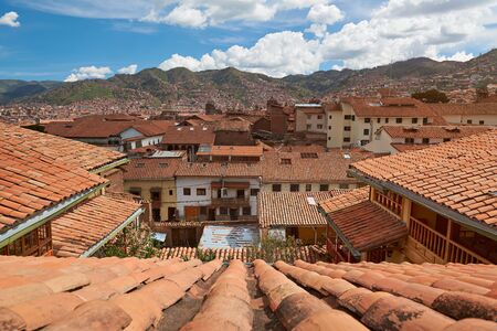 Cityscape of cusco city in Peu. Red roofs in cusco tourist cityの写真素材