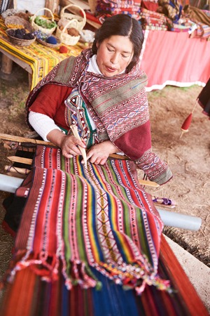 Cusco, Peru - April 21, 2017: Peruvian woman with inca wool. Local woman make traditional wool clothのeditorial素材