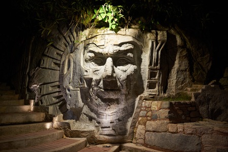 Agua Calientes, Peru - January 4, 2017: Illuminated inca face statue in Agua Calientes city Peruのeditorial素材