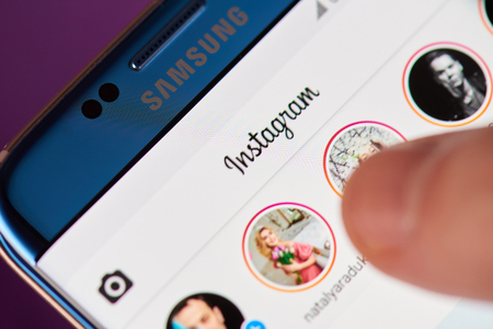 New york, USA - May 22, 2017: Instagram menu application on modern smartphone screen. Using instagram appのeditorial素材