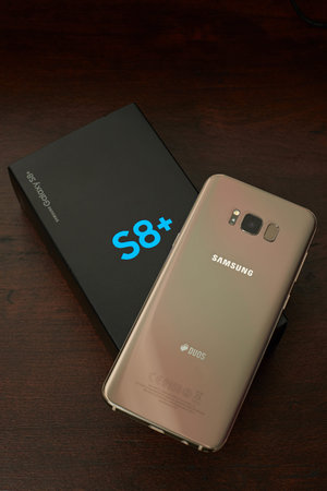 New york, USA - June 13, 2017: Unpacking new samsung s8+ phone. Box of new smartphone samsung galaxy...
