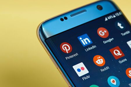 New york, USA - June 23, 2017: Social network application icon on smartphone screen close-up. Social network app icon with copy space on screenのeditorial素材