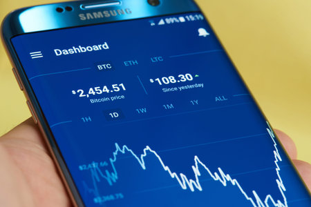 New york, USA - June 27, 2017: Growing graph of bitcoin price on mobile application coinbase