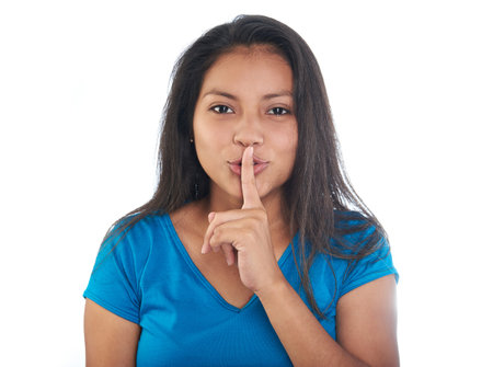 Girl hold silence gesture isolated on white background