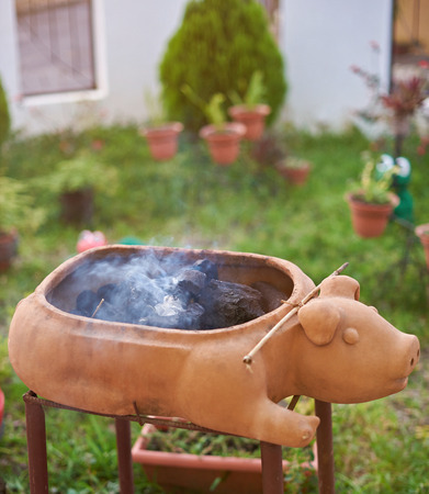Barbecue fire place with charcoal making smokeの写真素材