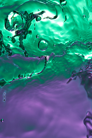 Abstract green water splash. Colorful water wallpaper patternの写真素材