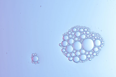 Micro of colorful water bubbles on clear water surface