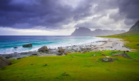 Windy norway whether. Cloudy sky over beach on Lofoten islands, Norway. Panoramic landscape of Lofoten coastline.の写真素材