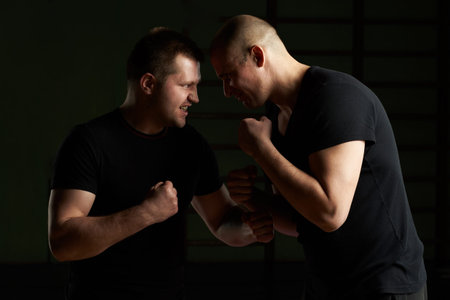 Two angry young man concept. Conflict situation between people