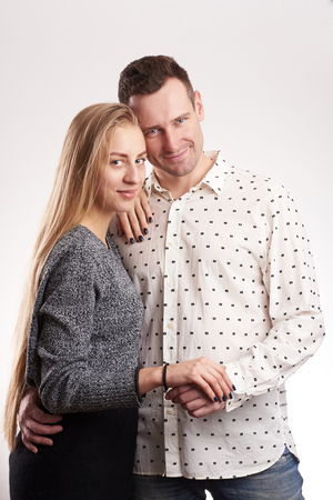 Young caucasian man and woman together isolated on white backgroundの写真素材