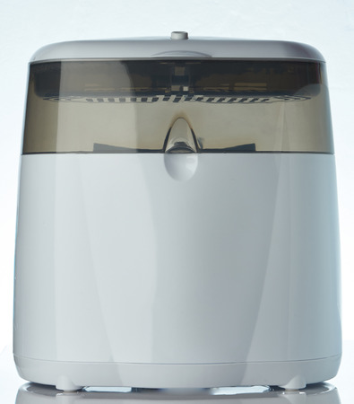 Electrical steam sterilizing machine isolated on white backgroundの写真素材