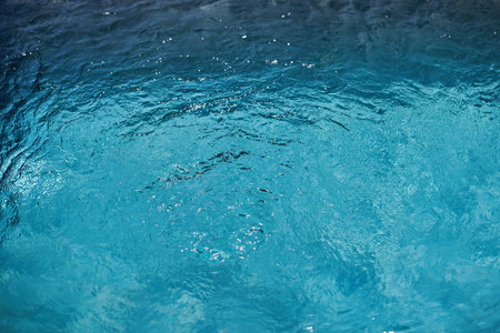 Blue water surface background. Pattern of clear sea water