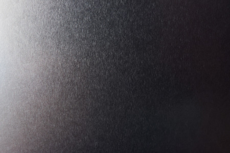 Steel stainless texture close-up.Macro of shiny metallic surfaceの写真素材