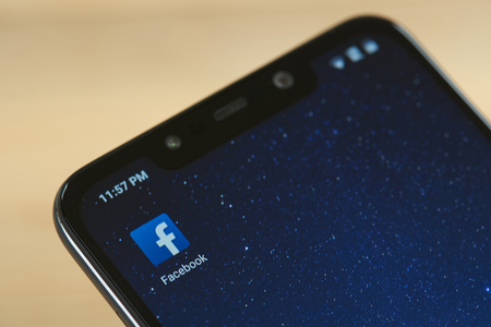 New york, USA - september 24, 2018: Facebook social media icon on smartphone screen close upのeditorial素材