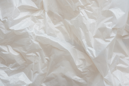 Texture of white wrinkled plastic background above viewの写真素材