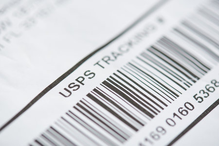 New york, USA - october 1, 2018: USPS tracking number close up view with bar code