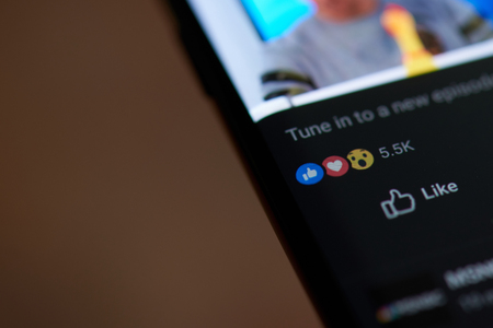 New york, USA - october 4, 2018: Like on Facebook on smartphone screen close up viewのeditorial素材