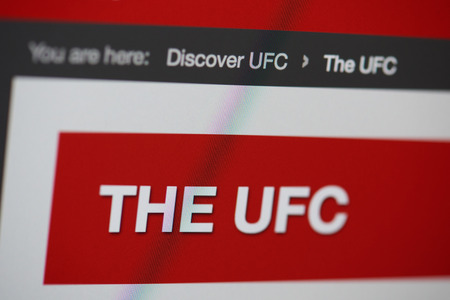 New york, USA - october 8, 2018: Discover UFC home page on laptop screen close up viewのeditorial素材