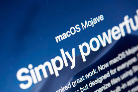New york, USA - october 23, 2018: Presentation of macOS Mojave on laptop screen close up viewのeditorial素材