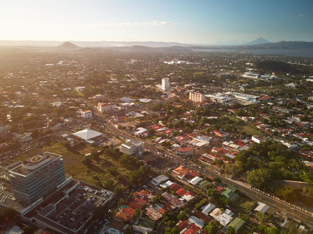 Sunset at Managua city in Nicaragua aerial drone viewの写真素材