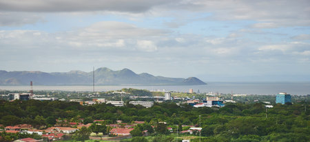 Managua city in bright sunny day aerial panorama view