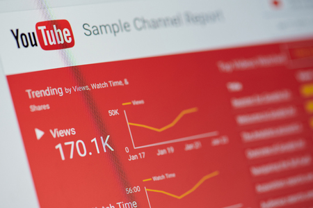 New york, USA - january 24, 2019: Youtube sample channel report menu on device screen pixelated close up viewのeditorial素材