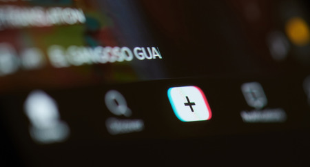 New york, USA - february 25, 2019:Dark menu in tiktok app on device screen pixelated close up viewのeditorial素材