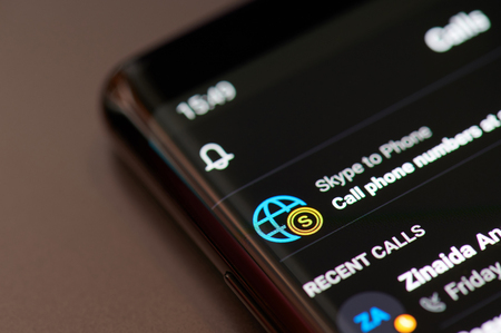 New york, USA - march 11, 2019: Skype to phone option on smartphone screen close up viewのeditorial素材