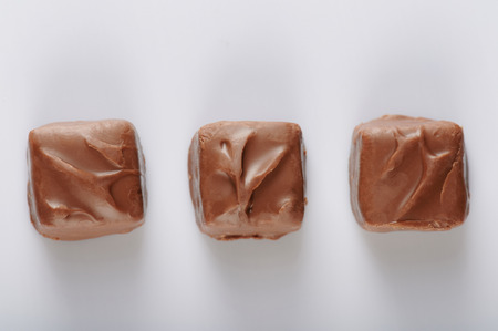 Chocolate bars above top view isolated on white backgroundの写真素材