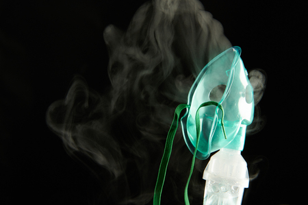 Inhalation mask with steam close up view isolatedの写真素材