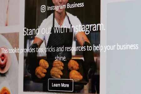 New york, USA - april 8, 2019: Instagram business theme on digital screen macro close up viewのeditorial素材