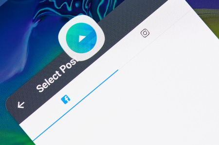 New york, USA - april 8, 2019: Facebook ads application on digital screen macro close up viewのeditorial素材