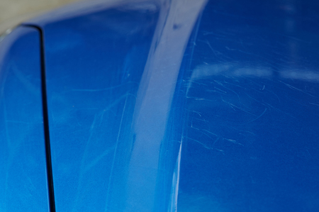 Scratches on car bonnet from cat clawsの写真素材