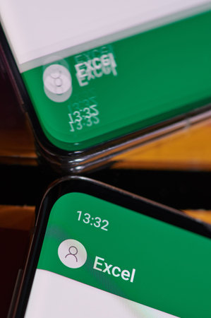 New york, USA - august 24, 2019: Using microsoft excel application on smartphone  macro close up ...