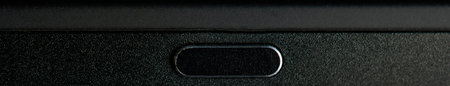 Black long metal real button close up view