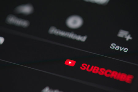 New york, USA - september 18, 2019: Subscribe sign on youtube video on laptop screen close up view