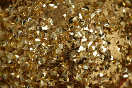 Gold metal glitter background. Abstract christmas bokeh