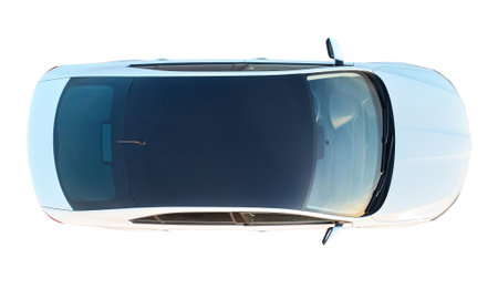 Real white car above top view with black roof isolated